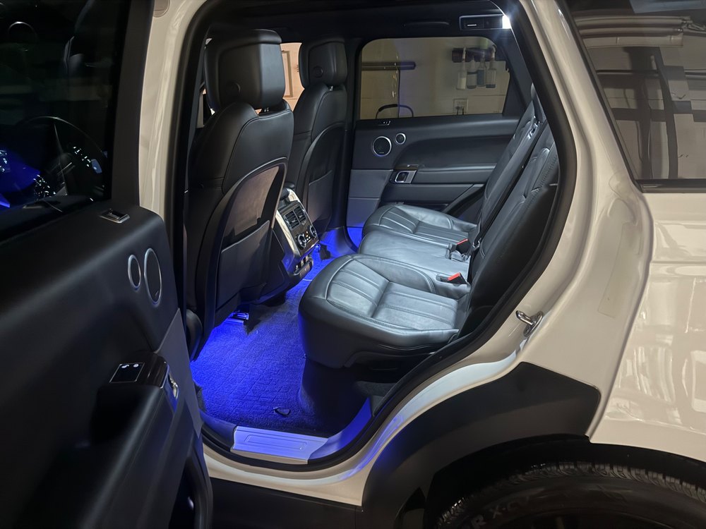 Range Rover cabin, lit blue by In the Details Auto Spa, Allison Park